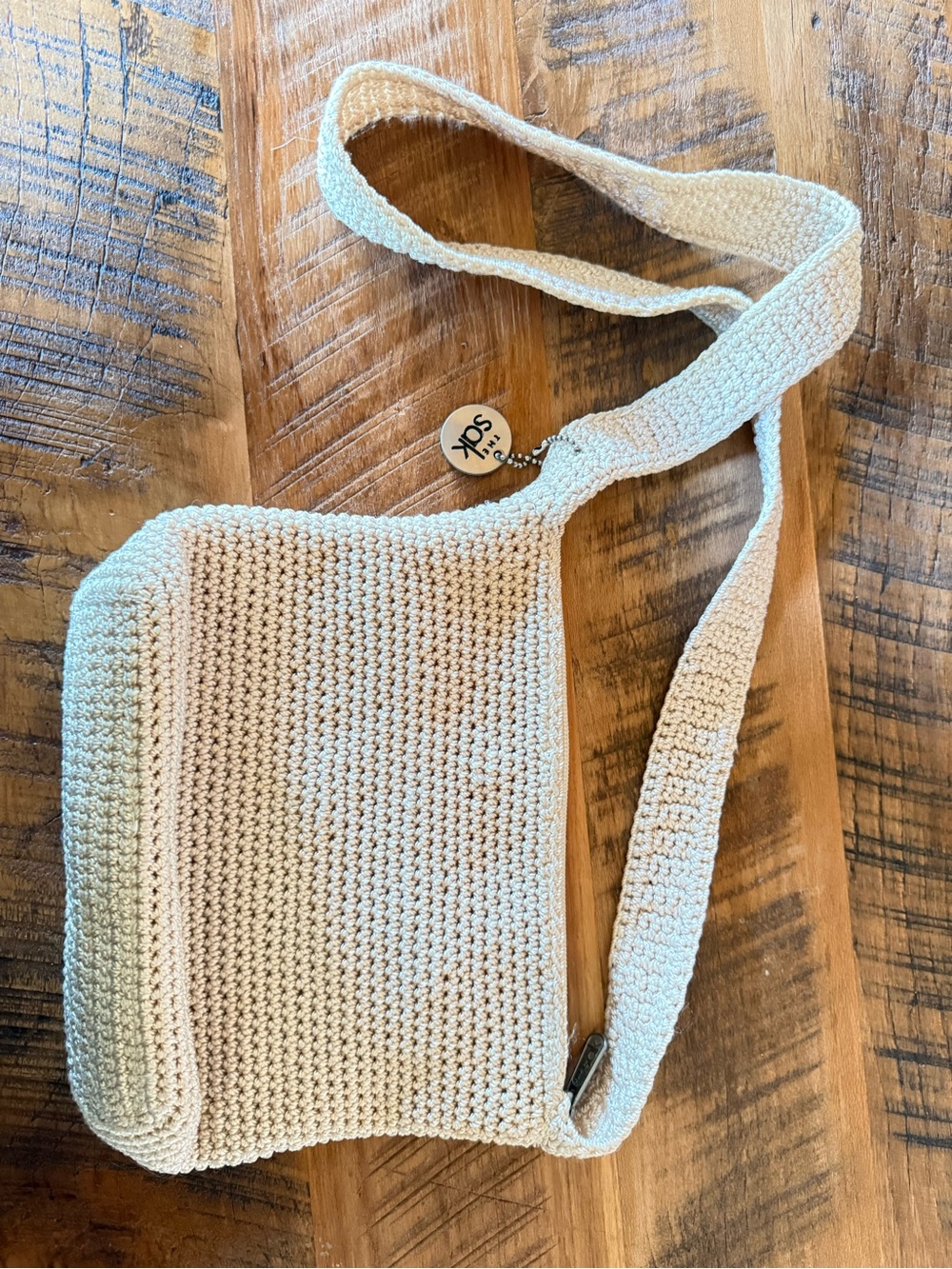 The Sak Cream Crochet Crossbody Bag with Wide Woven Strap